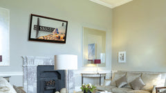 Add Vision AS0946T tilting landscape wall mount with VESA 600x400 for TVs, shown installed on a wall in a modern living room.