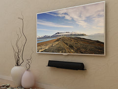 Add Vision AS3769F low-profile landscape wall mount for TVs up to VESA 900x600, shown installed on a wall.