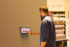 Add Vision AS110POS POS wall mount securely attached to a wall, designed for retail or hospitality point-of-sale systems.