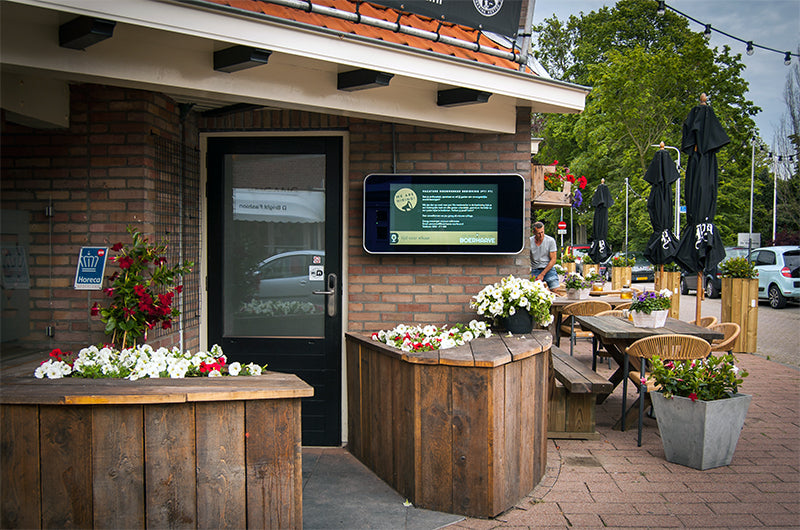 Outdoor LCD display by Add Vision showing vibrant digital signage content in an outdoor environment