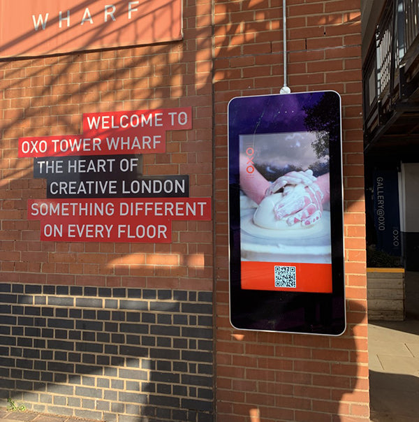 Outdoor LCD display by Add Vision showing vibrant visuals on a weather-resistant screen for outdoor advertising.