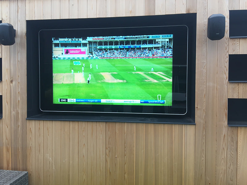 Outdoor LCD display by Add Vision showing vibrant graphics in an outdoor setting with weather-resistant casing.