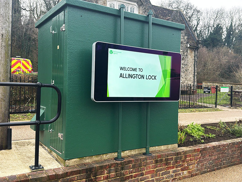 Outdoor LCD display by Add Vision showing vibrant graphics and weatherproof design for outdoor advertising and information display.