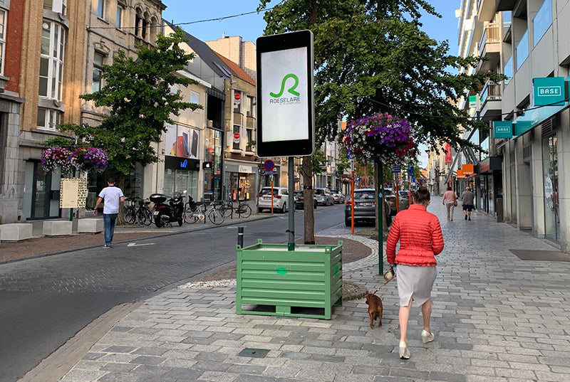 Outdoor LCD display by Add Vision showing vibrant digital signage content in an outdoor setting.