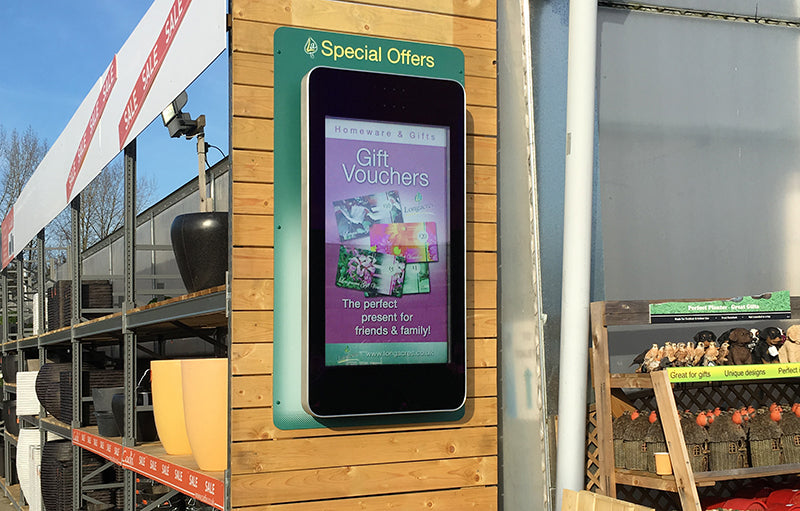 Outdoor LCD display by Add Vision showing vibrant outdoor digital signage in a public space