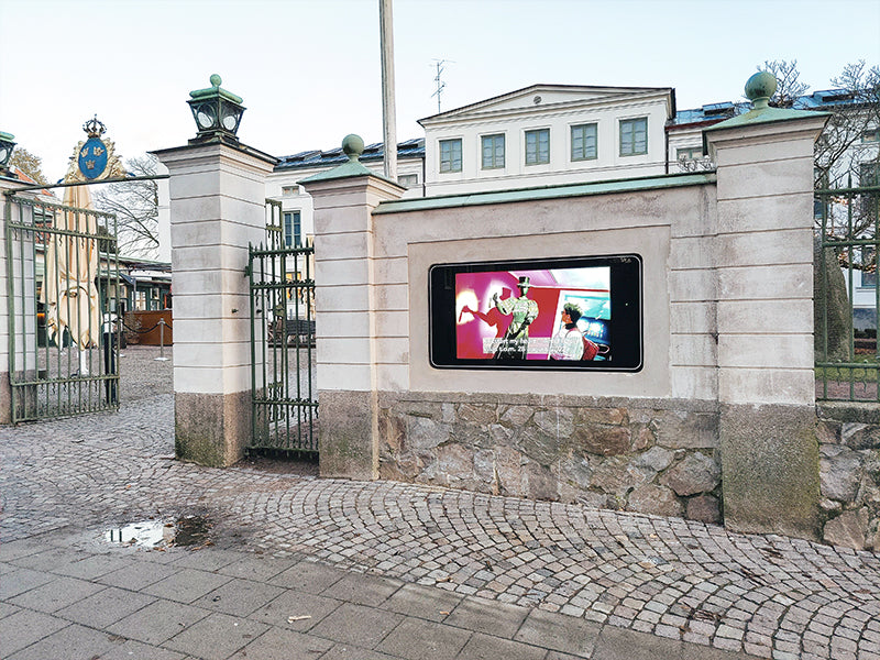 Outdoor LCD display by Add Vision showing vibrant visuals in an outdoor setting with weather-resistant design.