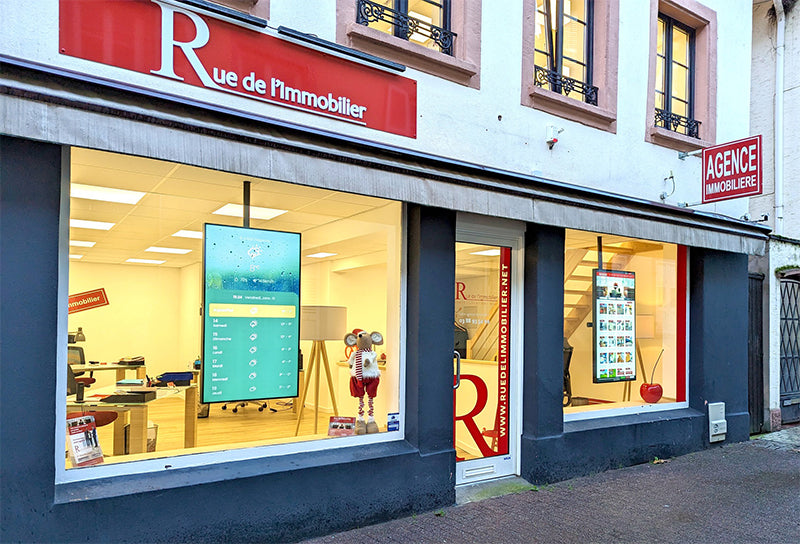 Add Vision Ultra High Brightness Window Display showcasing vibrant, illuminated marketing visuals on a large glass storefront.