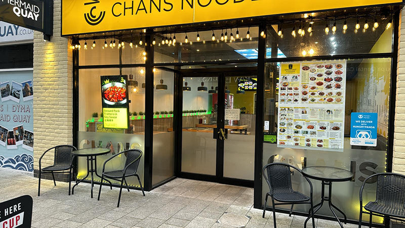 Add Vision ultra high brightness window display showcasing vibrant visuals in a retail setting.