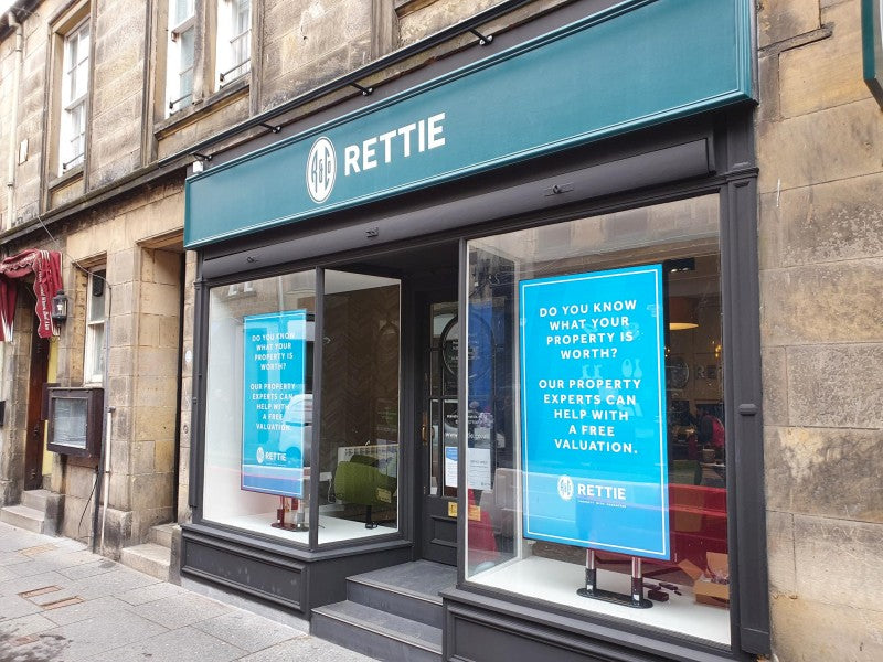 Add Vision Ultra High Brightness window display showcasing vibrant, illuminated advertising for retail storefronts.